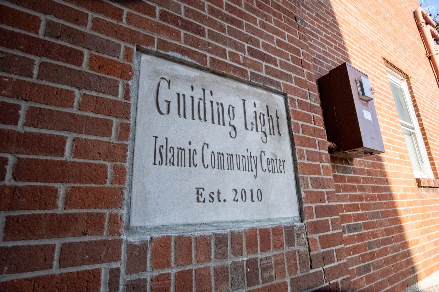 Engraved stone set in the brick wall: Guiding Light Islamic Community Center, Est. 2010